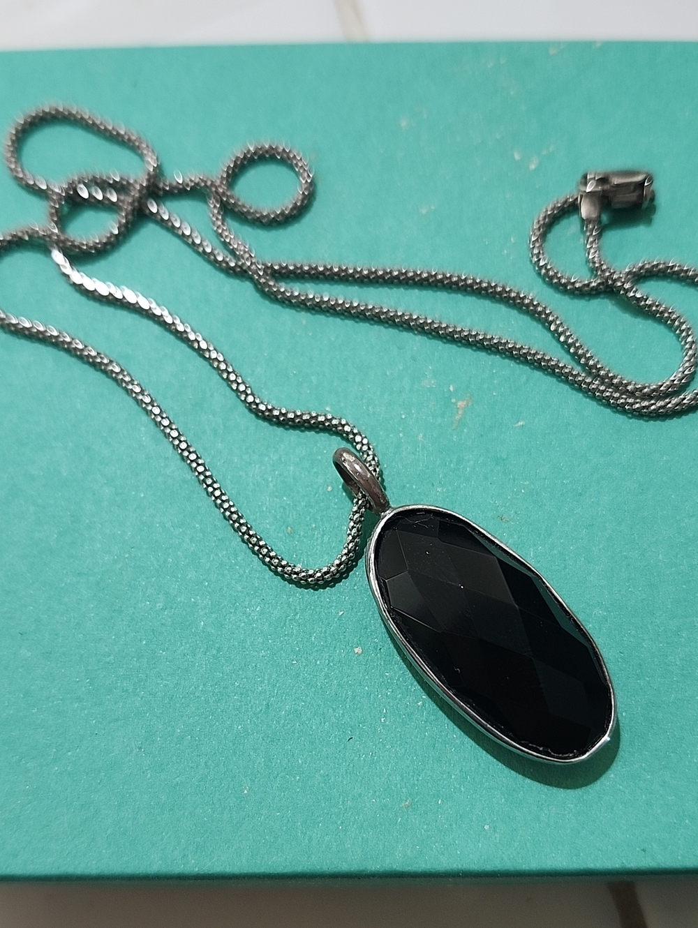 Black Faceted Oval Pendant on Sterling Silver Necklace
